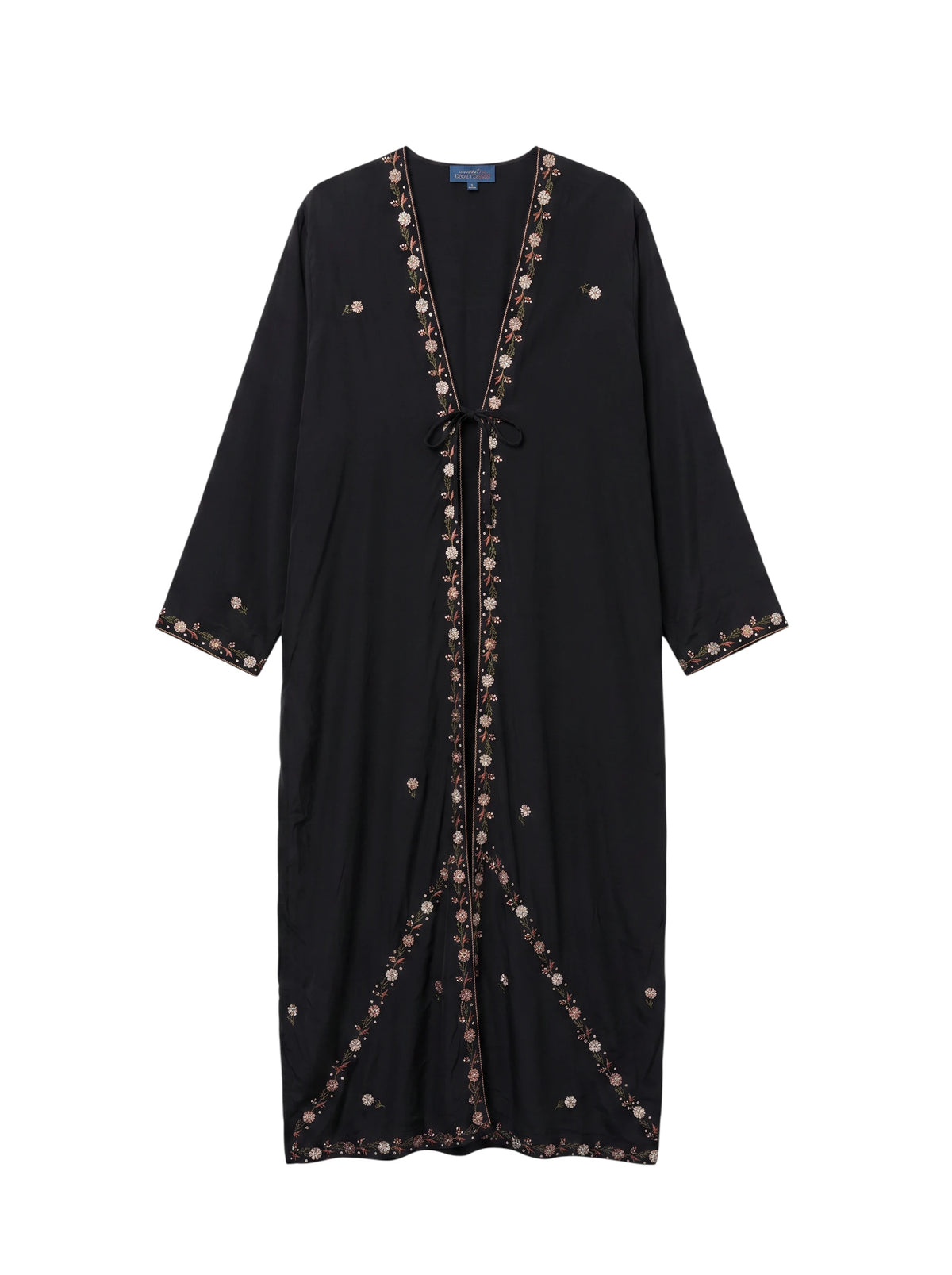 Flatlay frontside the Eternal natural silk black and flowers embroideries