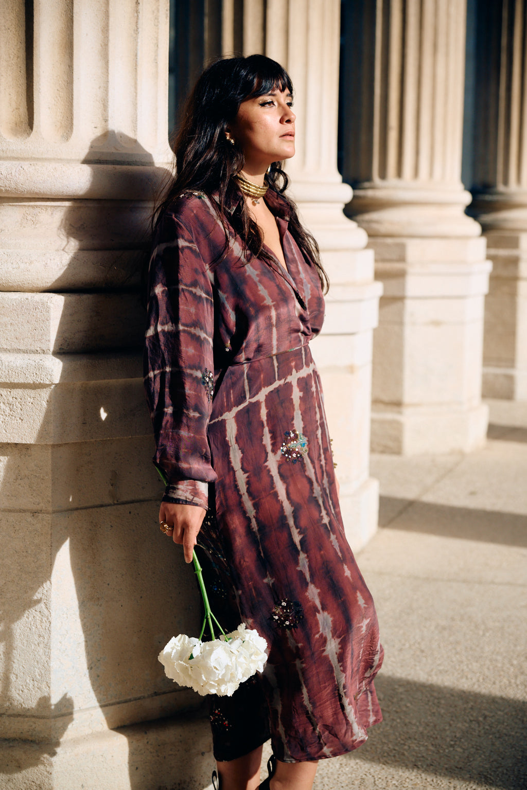 Long dress crafted from a vintage Indian sari. Puffed sleeves, shirt collar, wrist cuffs. One-of-a-kind.
