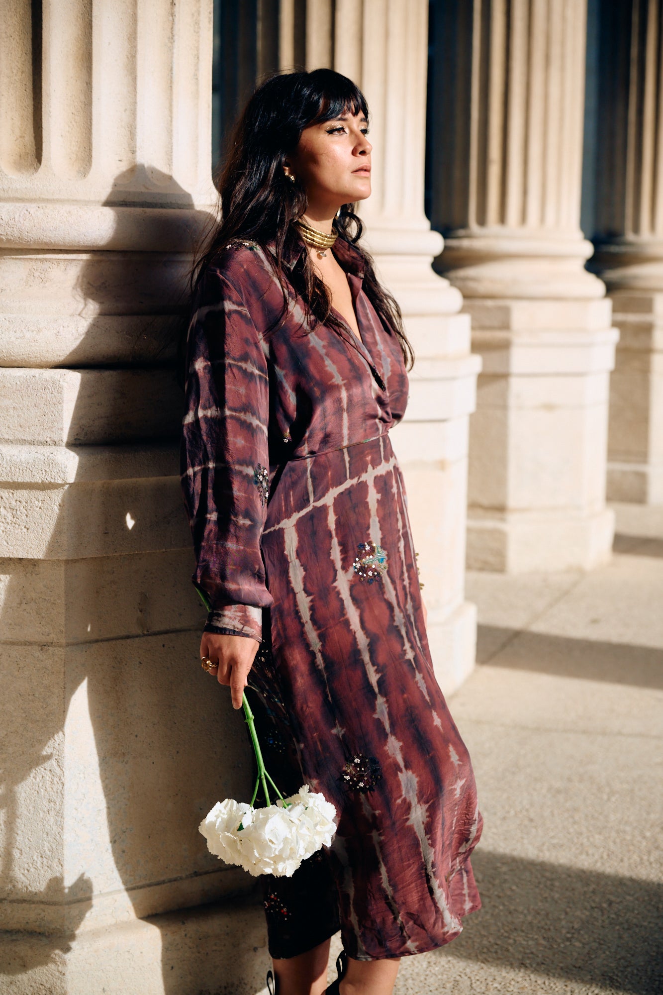 Long dress crafted from a vintage Indian sari. Puffed sleeves, shirt collar, wrist cuffs. One-of-a-kind.