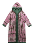 Flatlay frontside of The Ritual The Solstice Coat green velvet lining and pink natural silk with handmade embroidery